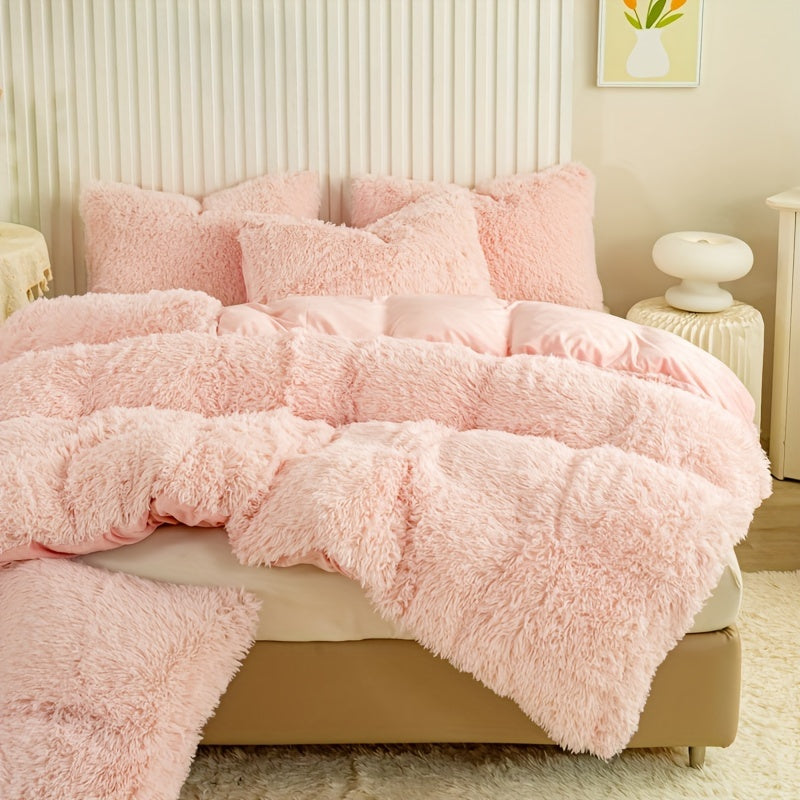 Pink fluffy duvet set on a bed
