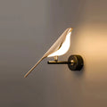 Wandleuchte mit goldenen Vögeln für das Schlafzimmer | Desfino