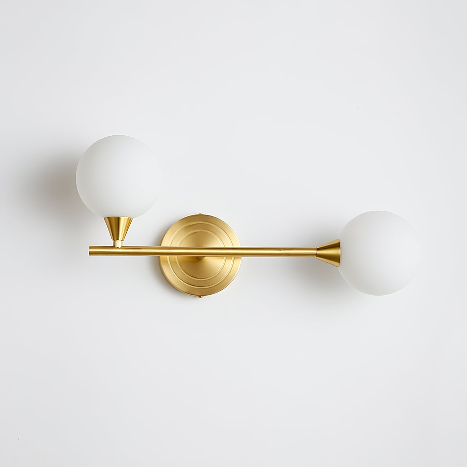 Holten Brass Armed Sconce — Two White Glass Globes
