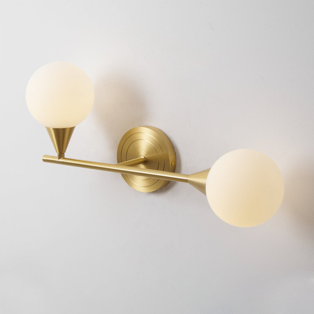 Holten Brass Armed Sconce — Two White Glass Globes