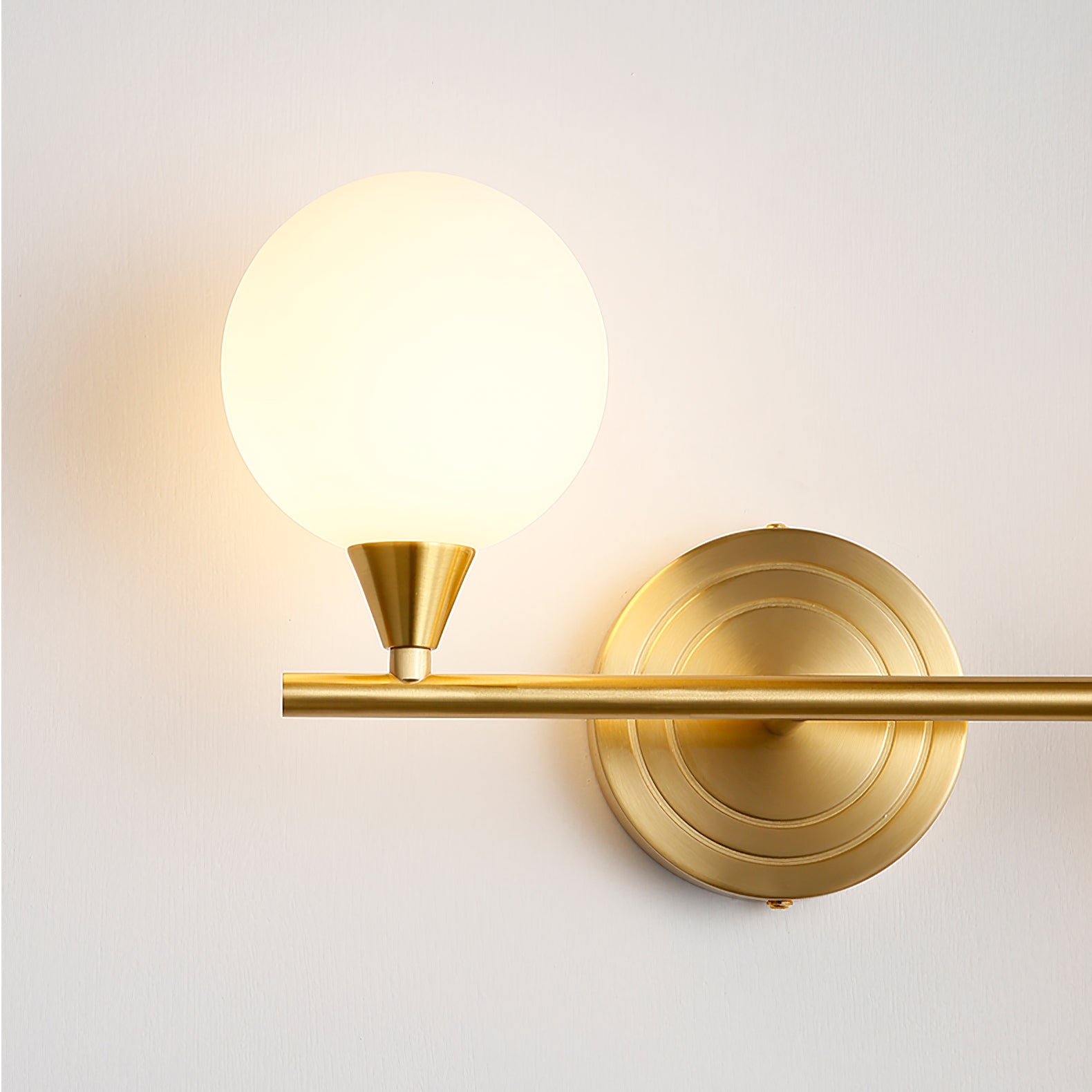 Holten Brass Armed Sconce — Two White Glass Globes