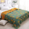 Couvre-lit jacquard réversible douillet Liora, motif de feuilles de ginkgo en silhouette | Desfino