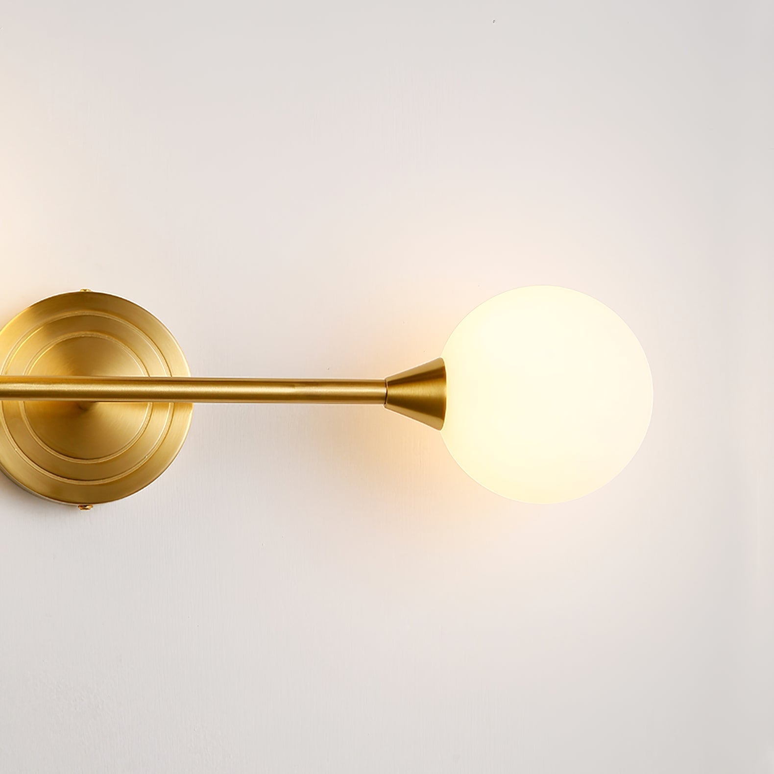 Holten Brass Armed Sconce — Two White Glass Globes