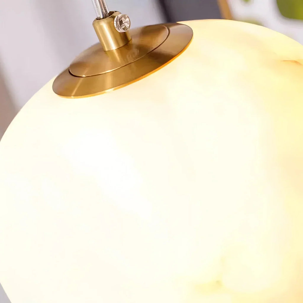 Moderne Pendelleuchte aus spanischem Alabaster in Kieselform | Desfino