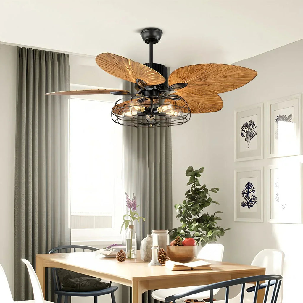 Deckenventilator mit Leuchte und tropischen Palmenblättern im Industriestil | Desfino