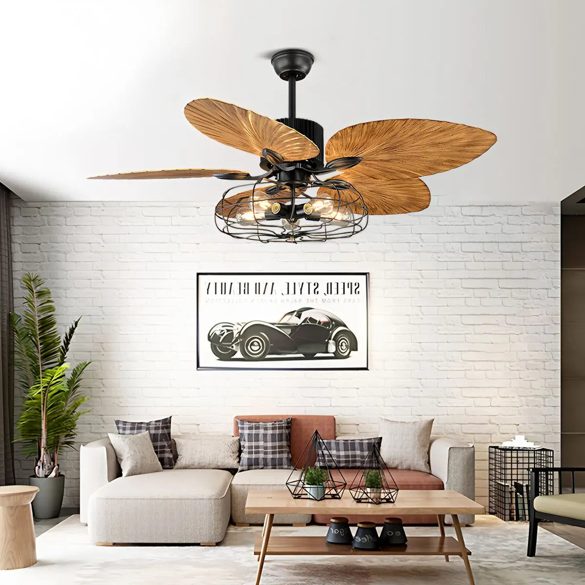 Deckenventilator mit Leuchte und tropischen Palmenblättern im Industriestil | Desfino