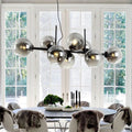 Aveline-bubbelkroonluchter — zwarte en gouden hanglamp van 56 W, 40 x 110cm - Desfino