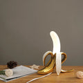 BananaShine Bananenlampe — Tischleuchte in Bananenform, verspielte Dekoration - Desfino