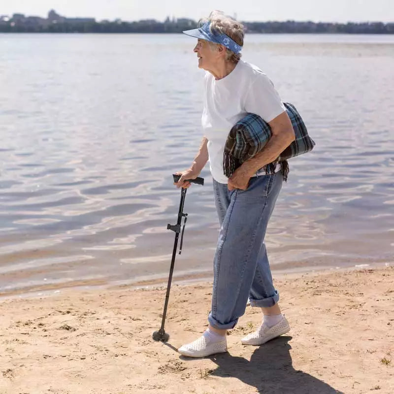 StrideFlex Foldable Walking Cane — LED Light, Anti-Shock, Quad Base - Desfino