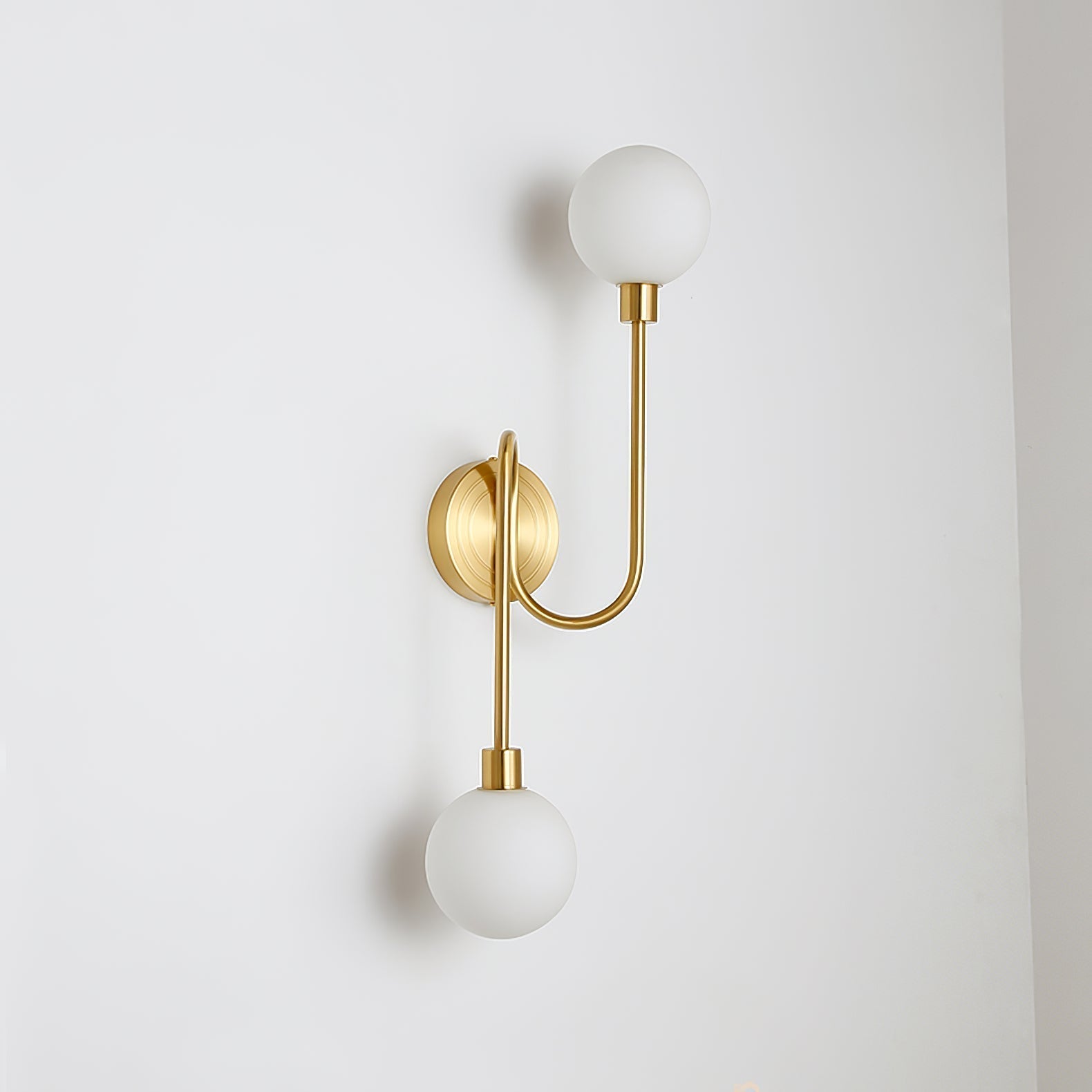 Holten Brass Armed Sconce — Two White Glass Globes