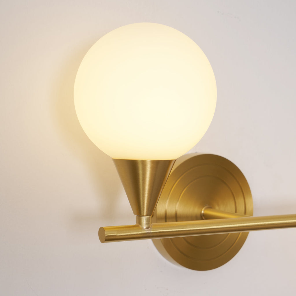 Holten Brass Armed Sconce — Two White Glass Globes