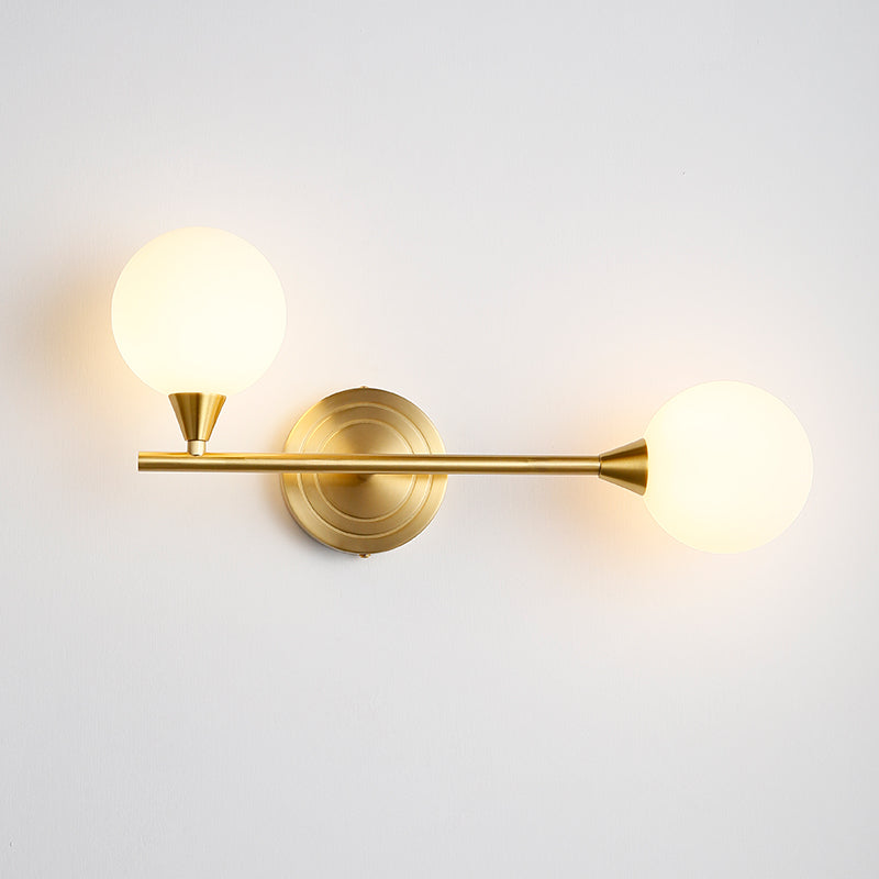 Holten Brass Armed Sconce — Two White Glass Globes