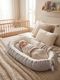 Babynest — Atmungsaktive Baumwolle & gepolsterte Seitenwände