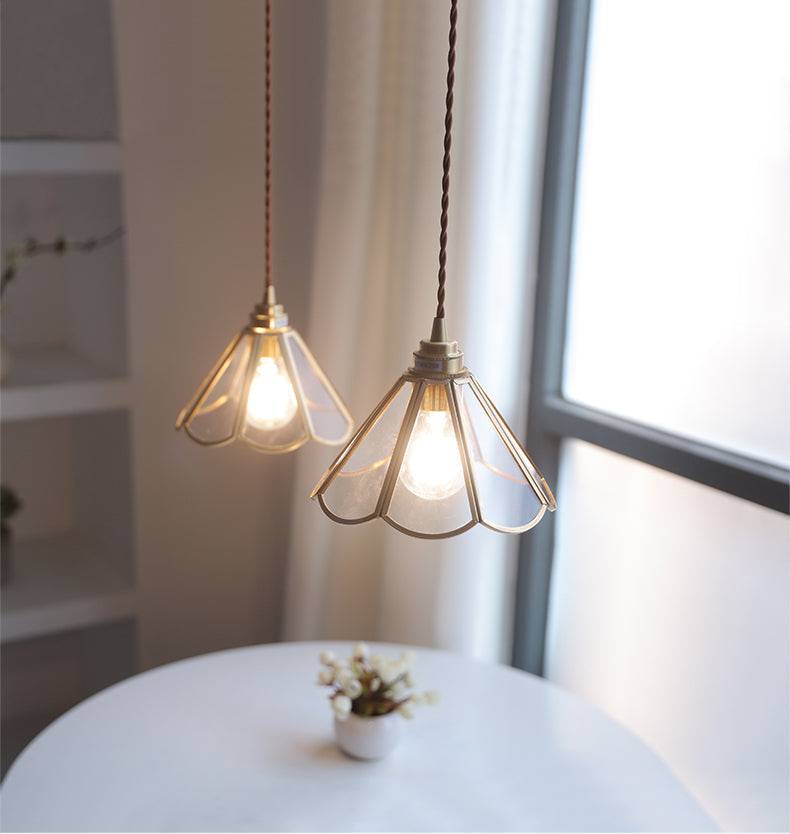 Elara messing hanglamp - heldere glazen kap, gedraaid snoer - Desfino