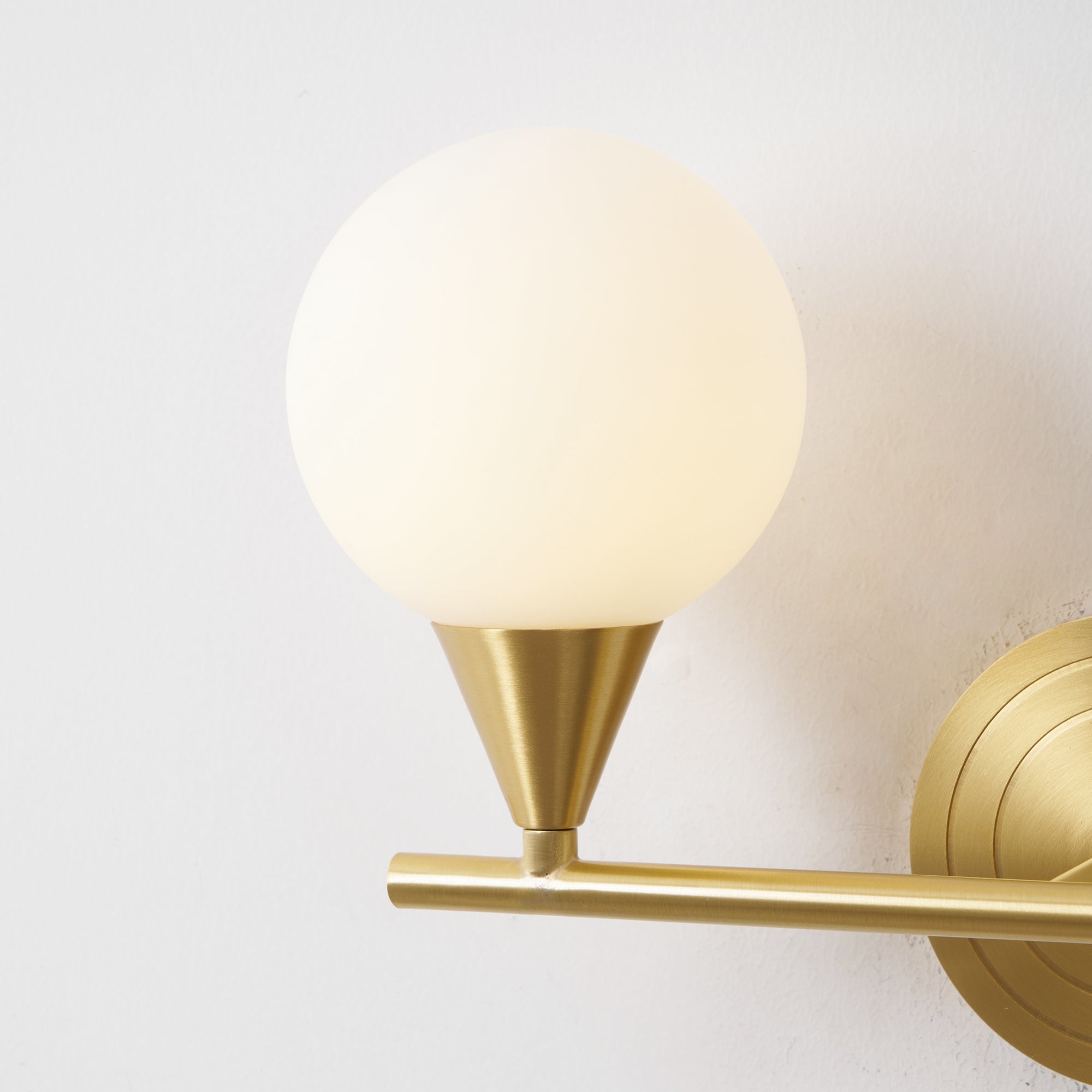 Holten Brass Armed Sconce — Two White Glass Globes