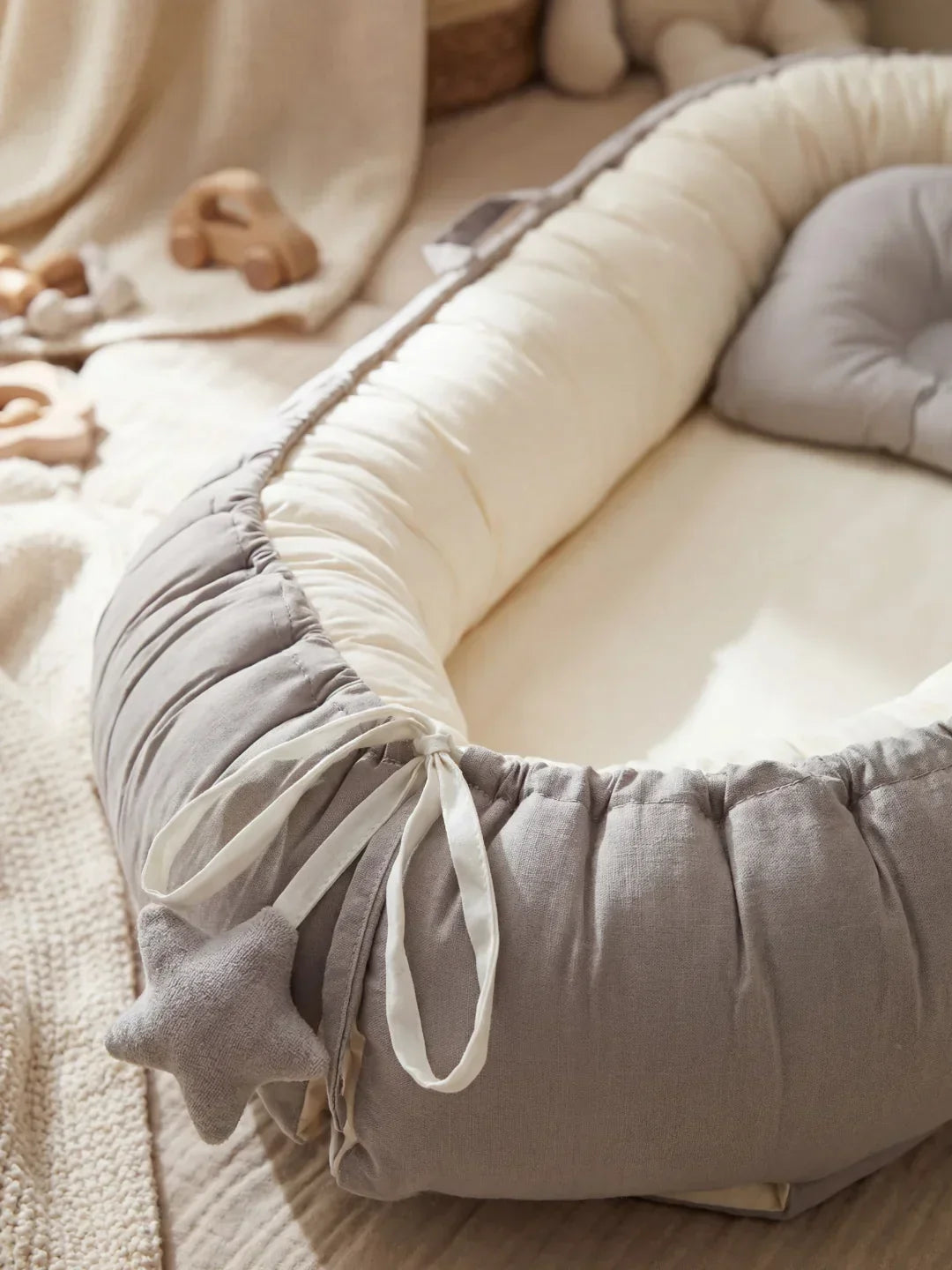 Babynest — Atmungsaktive Baumwolle & gepolsterte Seitenwände
