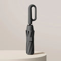 Parapluie compact automatique NimbusGuard — Revêtement protecteur solaire UPF50+ - Desfino