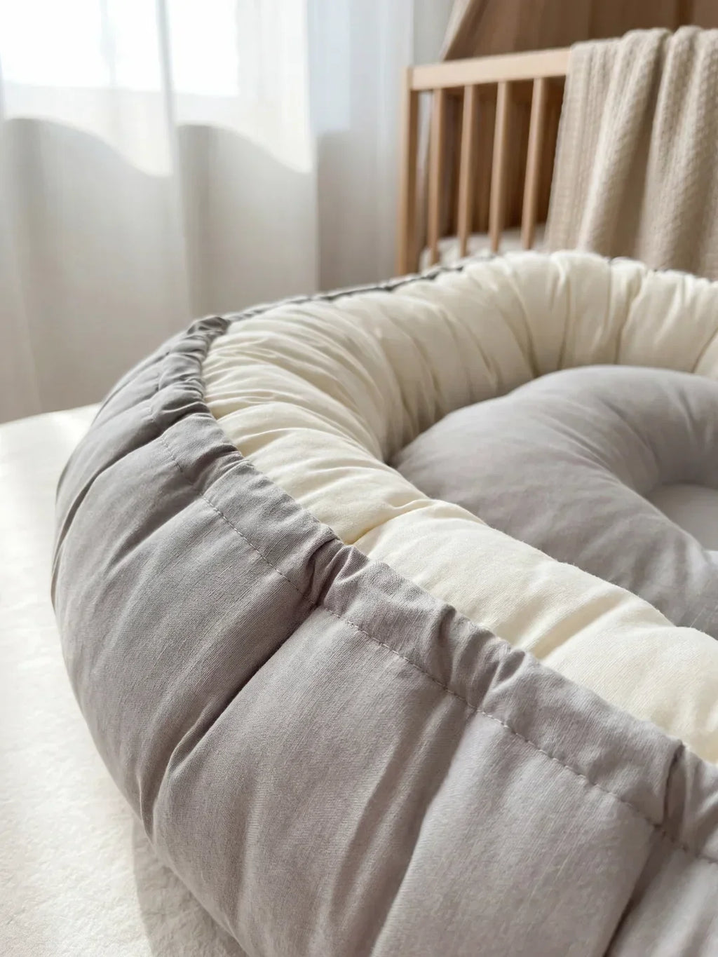 Babynest — Atmungsaktive Baumwolle & gepolsterte Seitenwände